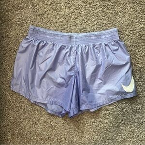 purple nike athletic shorts - m